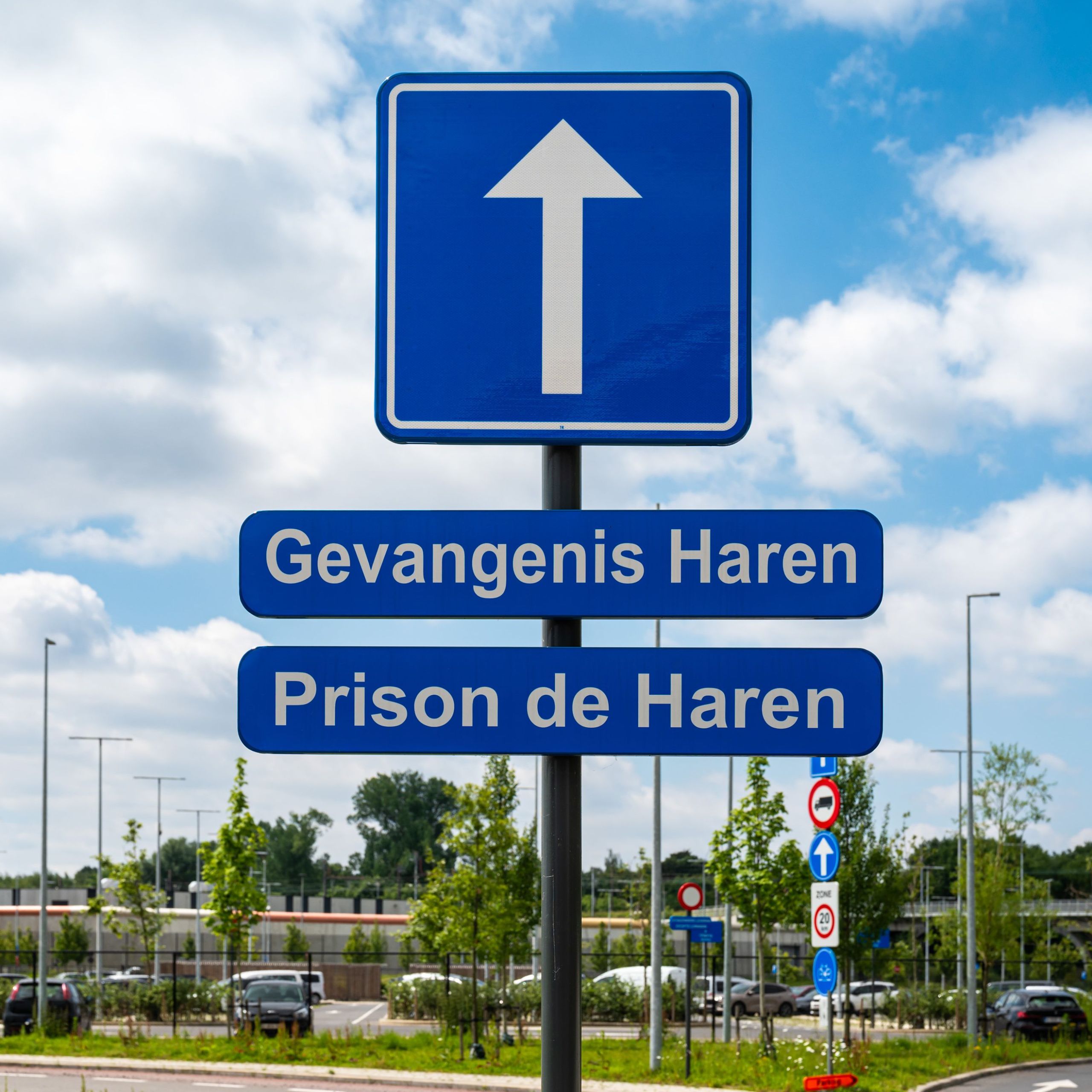 haren, flanders, belgium road sign to the the prison of haren, a new penitentiary institution